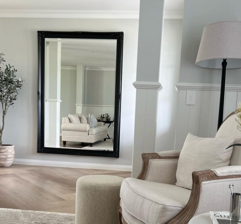 Champagne Black on blank wall.